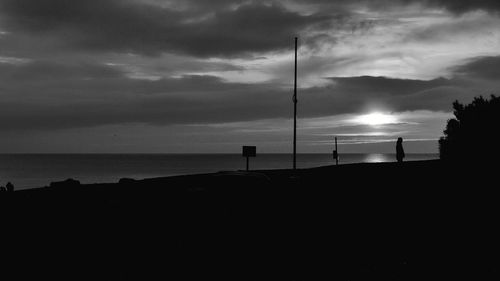 Scenic view of sea against sky at sunset