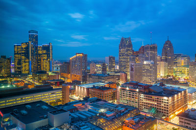 Illuminated buildings in city at night