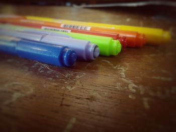 Close-up of colored pencils on table