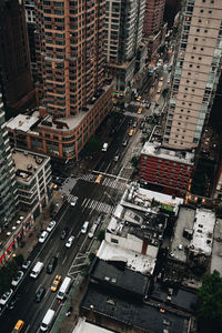 Aerial view of traffic on city street and buildings