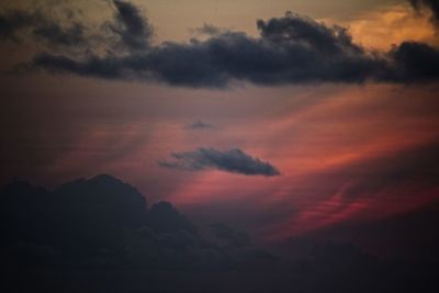 Low angle view of dramatic sky during sunset