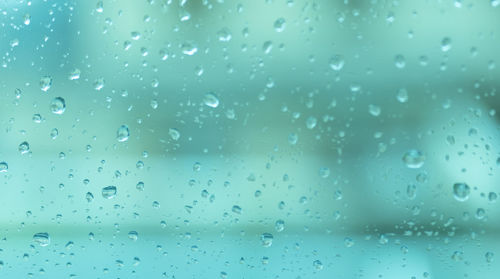 Full frame shot of water drops on glass