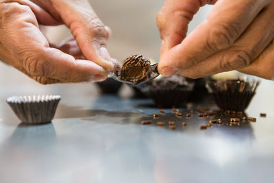 Close-up of hands holding ice cream