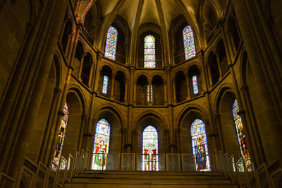 Low angle view of stained glass window of building