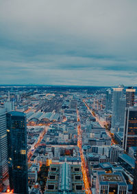 High angle view of buildings in city against sky