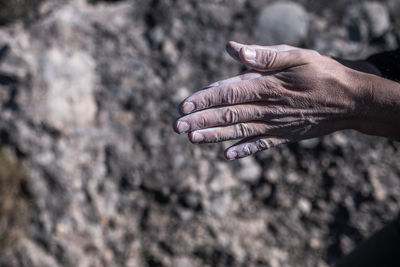 Close-up of a climber's hands with magnesium