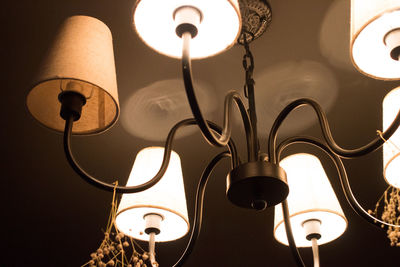 Low angle view of illuminated lights