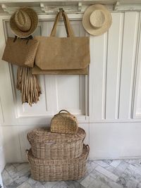 Wicker basket hanging on wall