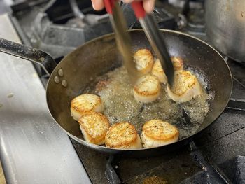 High angle view of meat in cooking pan