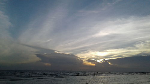 Scenic view of sea against sky at sunset