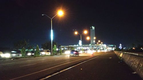 Illuminated street lights at night