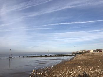 Scenic view of beach against sky