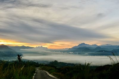 Scenic view of mountains against sky during sunset