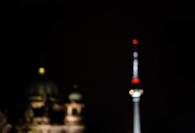 Defocused tower at night