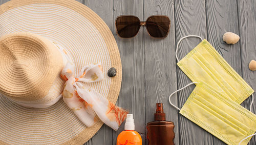 High angle view of straw hat on table