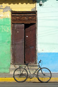 Bicycle against door