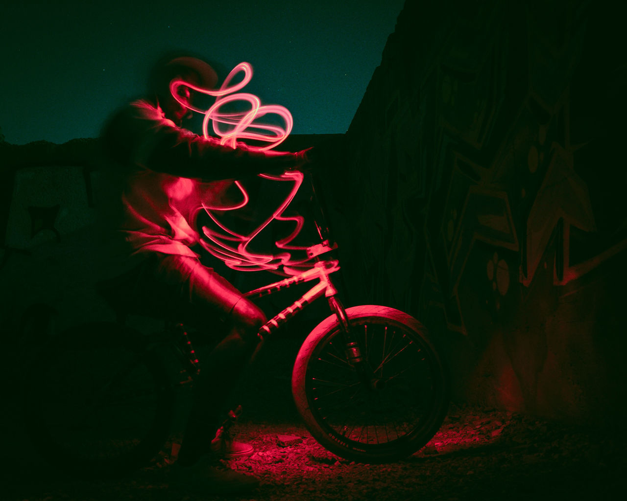 night, illuminated, red, outdoors, land vehicle, no people