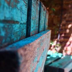 Close-up of rusty metal against wall