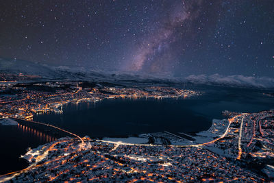 Tromsøysundet tromsø norway landscape and cityscape panorama with mountainous background in winter. 