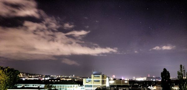 Illuminated cityscape at night