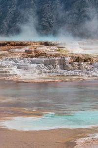 Colorful landscape of mineral deposits at canary hot springs in yellowstone national park, montana