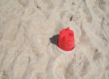 High angle view of heart shape on sand