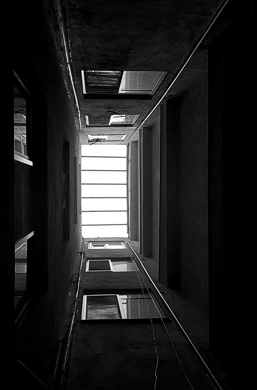 darkness, architecture, black, light, black and white, indoors, monochrome, built structure, monochrome photography, no people, white, building, the way forward, corridor, arcade, house, window, dark, day