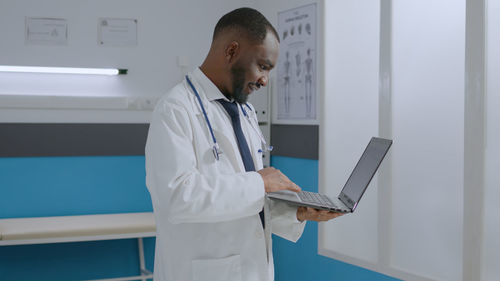 Doctor using digital tablet