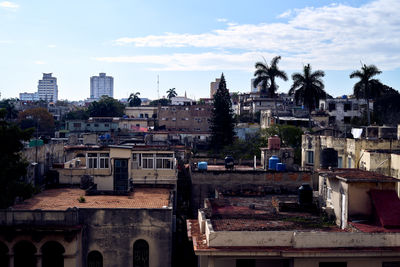 Buildings in city against sky