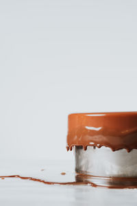 Close-up of dentures against white background