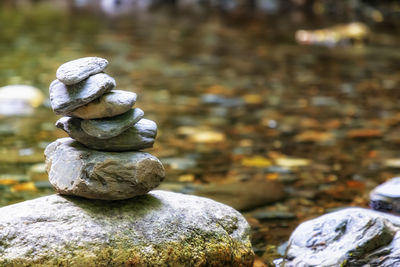 Close-up of stone stack on rock