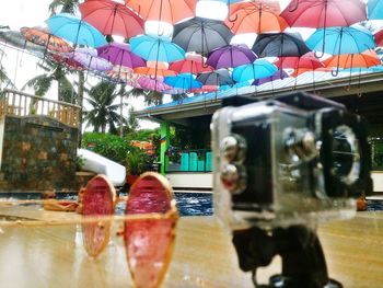 Close-up of reflection in amusement park by swimming pool