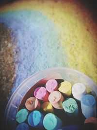 High angle view of multi colored candies on table