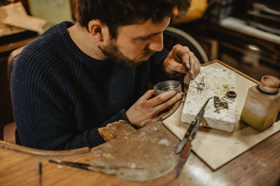 Man working on table