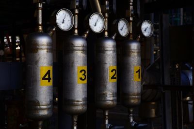 Close-up of cylinders in factory