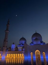 Mosque against sky at dusk