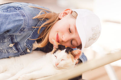 Girl with cat at home