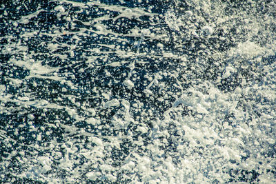 Full frame shot of snow on landscape against sky