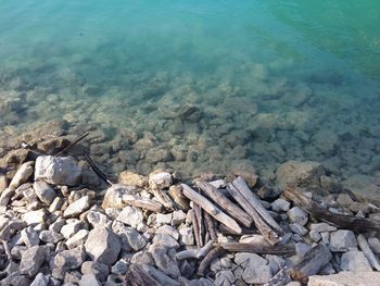 High angle view of rocks in sea