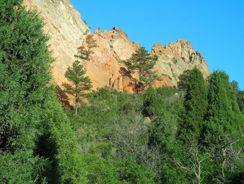 Scenic view of rocky mountains against clear sky