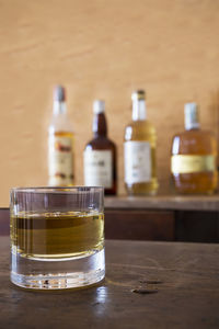 Close-up of beer glass on table