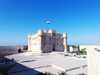 View of fort against blue sky