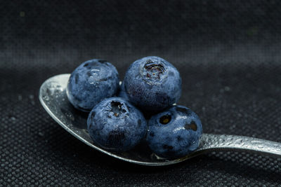 Close-up of fruits in plate on table