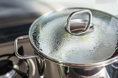 Close up of a fish being steamed in a pot