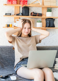 Young woman using mobile phone