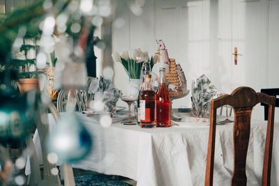 Close-up of christmas table setting at home