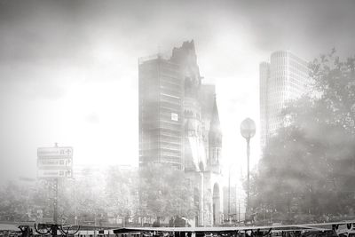 Low angle view of buildings against sky in city