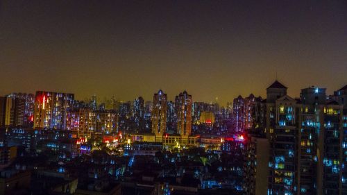 Illuminated cityscape at night