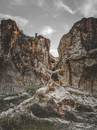 Panoramic view of rocky mountains against sky