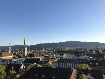 Aerial view of townscape against sky
